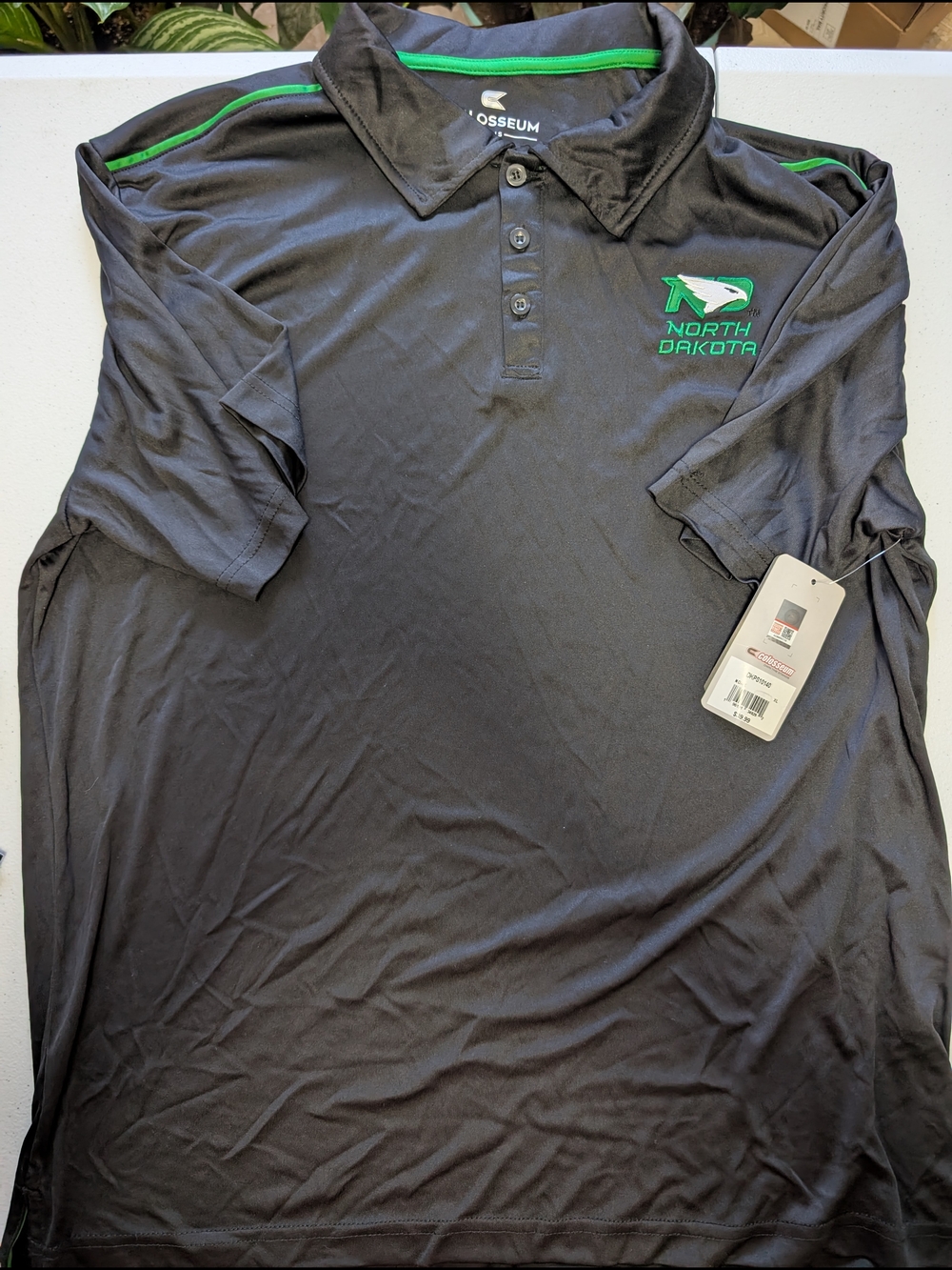 Coliseum North Dakota Black Polo with Green Trim